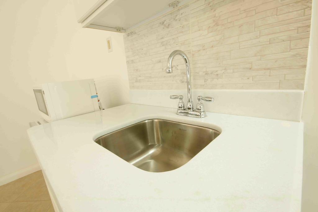 Cattleya Luxury Suites Kingston Rom bilde